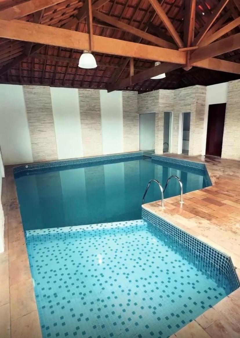 Com Casa de hóspedes *