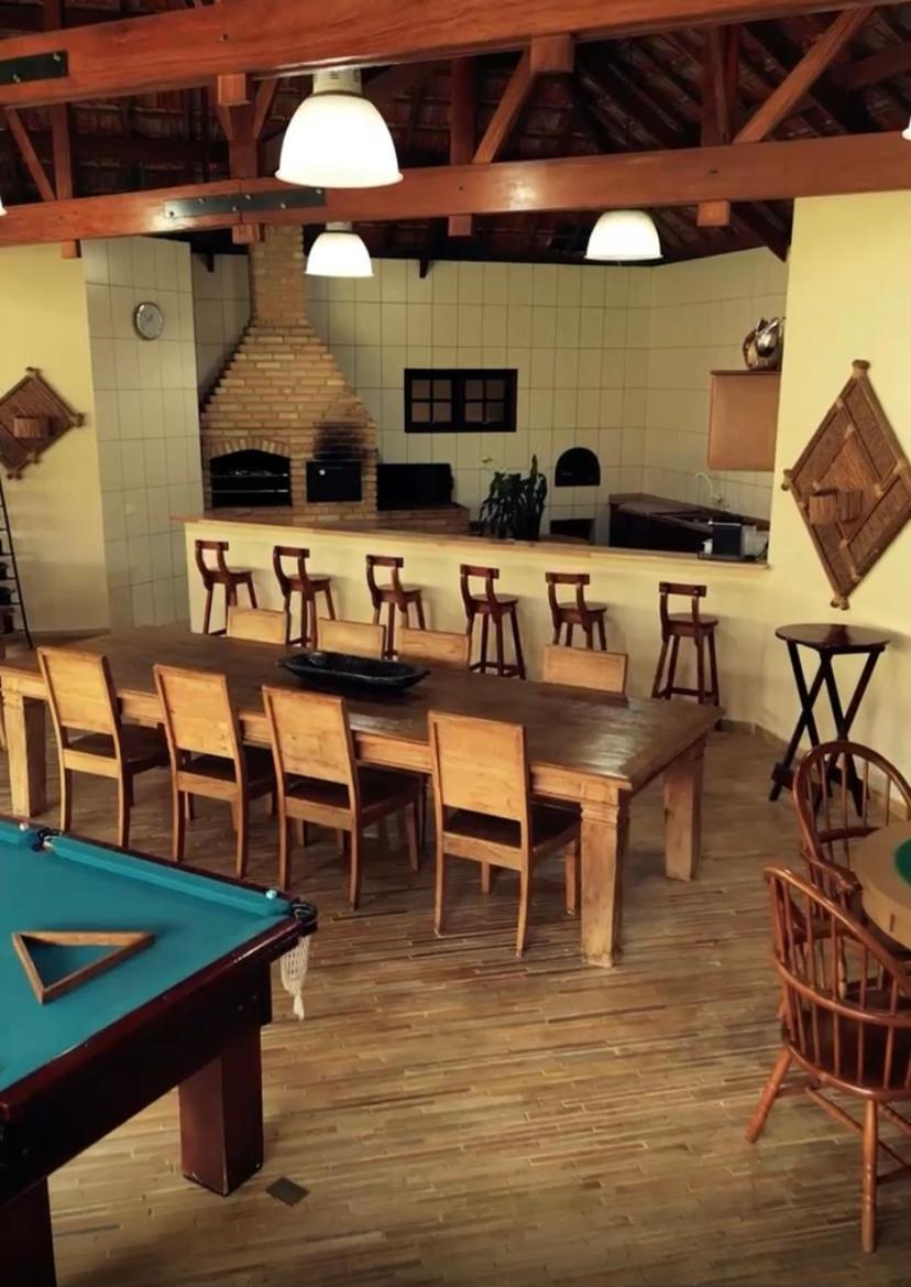 Com Casa de hóspedes