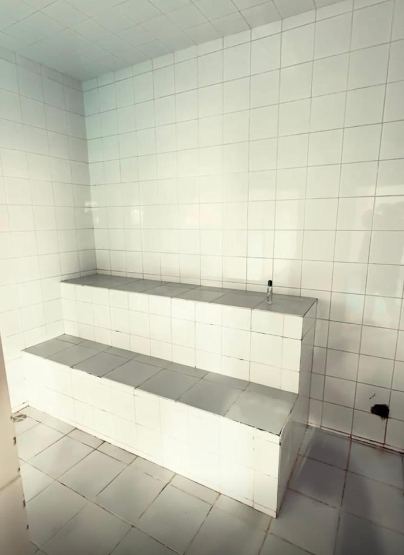 Com Casa de hóspedes *